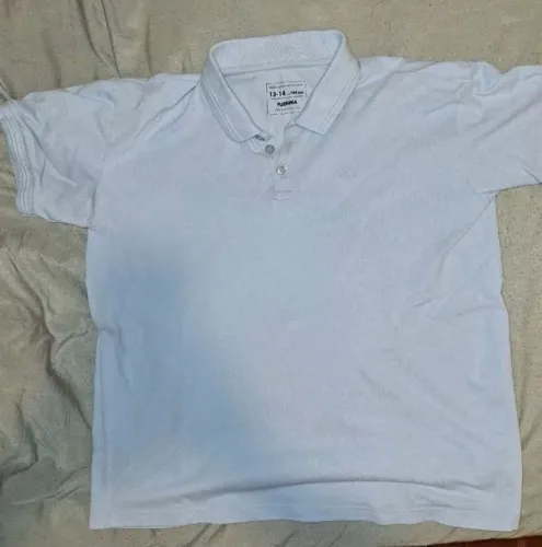 camisa polo azul clara infantil