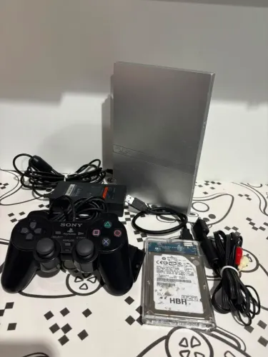 ? PLAYSTATION 2 SLIM PRATA - R$350