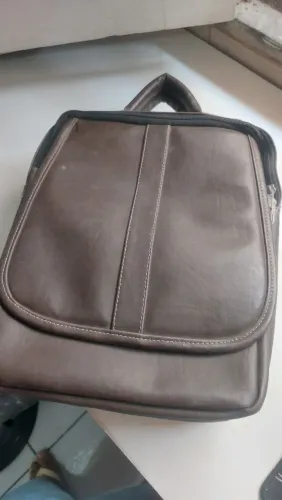 Mochila e bolsa de lado em couro executivo