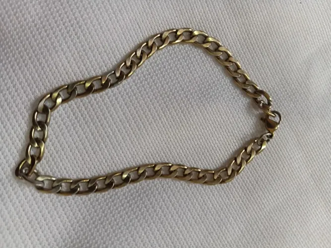 Pulseira de aço banhada a ouro