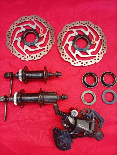 KIT MTB OGGI 7.0 2024 - PEÇAS ORIGINAIS SHIMANO / CUBOS / Discos 