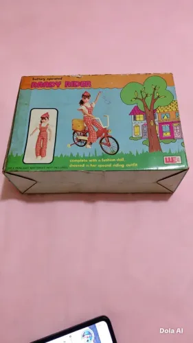 Randy Rider Vintage Fashion Doll on Bicycle
