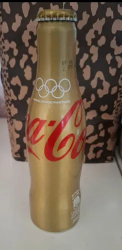 Garrafa de alumínio dourada Coca-Cola