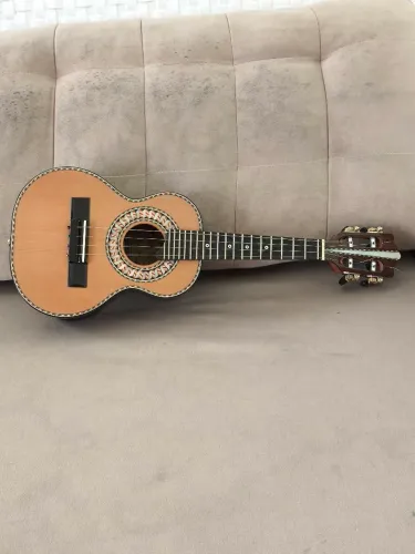 Cavaco Rubens Leão de jacarandá 