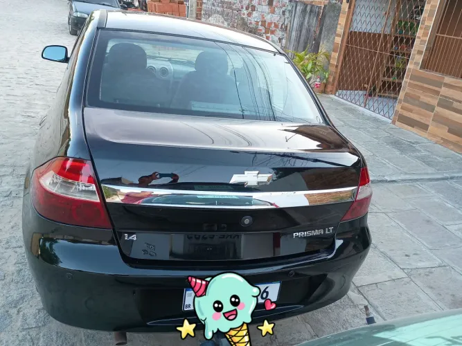 vende-se um Prisma 2012 1.4 tem manual e chave reserva