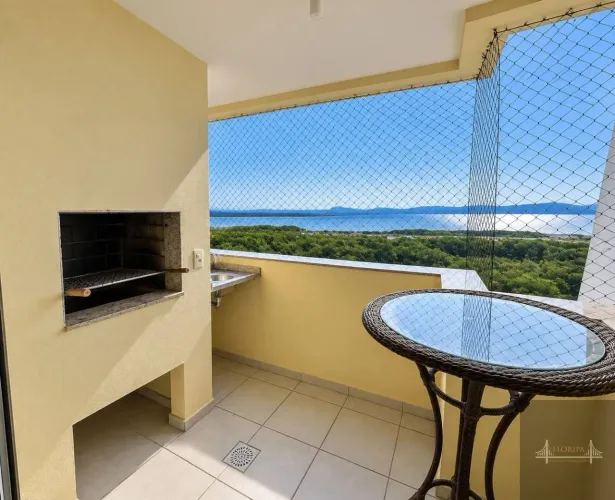 Apartamento com 3 dormitórios à venda, 77 m² por R$ 699.000,00 - Costeira do Pirajubaé - F