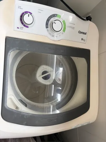 Máquina de lavar com defeito 