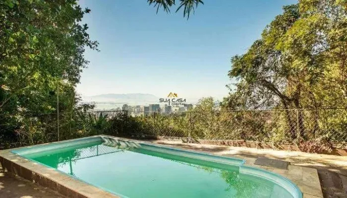 Santa Teresa | Exclusiva casa à venda em Santa Tereza | 6 suítes, elegância e conforto. RE