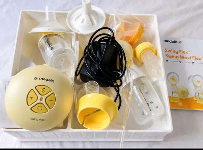 bomba extratora de leite Medela Swing (dupla) semi nova