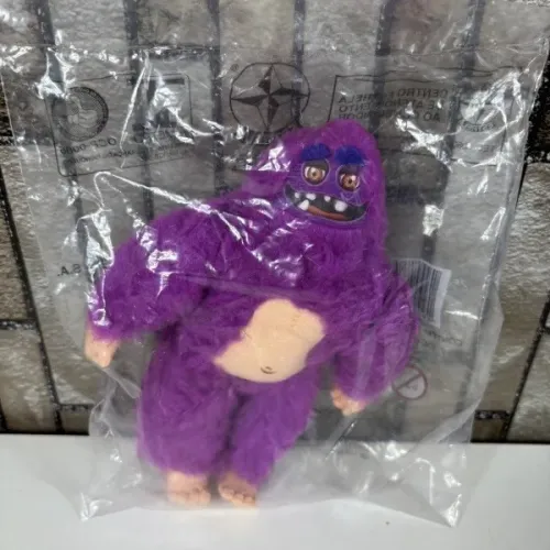 boneco de pelúcia monstro da anuidade - marca estrela - 19 cm