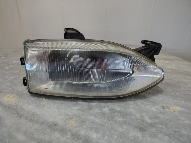Farol esquerdo ORIGINAL CIBIE Fiat Palio 1996 - 2000