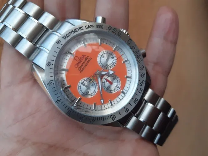 Relógio Omeg Olympic Mostrador Laranja Prata 46mm BIg Size Pulseira Aço