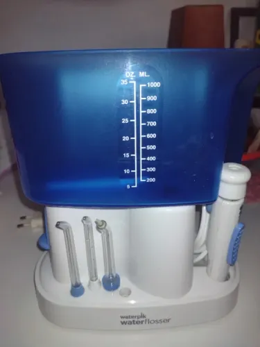 Limpador dental e de aparelhos