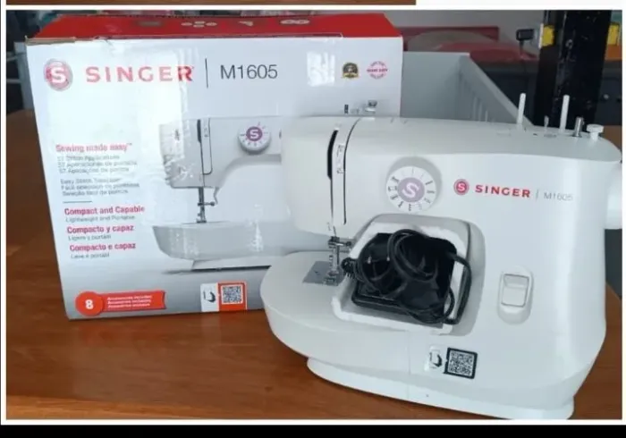 Máquina de costura singer