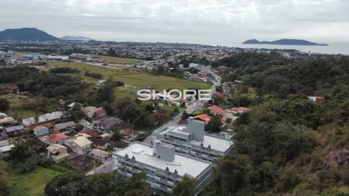 Apartamento de 2 dormitórios, sacada com churrasqueira, financiável