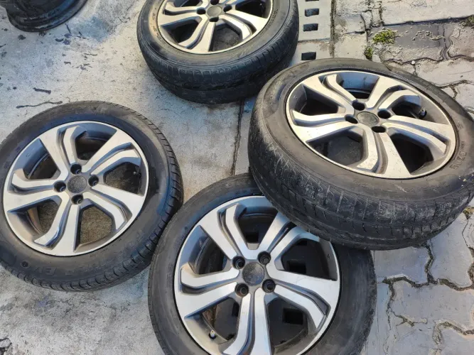 Vendo rodas 16 4X100 ..COM PNEUS MEIA VIDA BONS