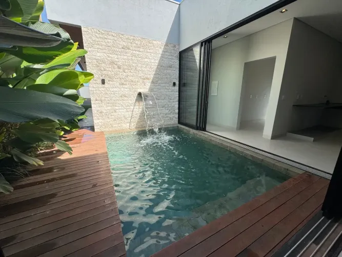 Casa de Condomínio à venda com 3 suítes, escritório, piscina, na Zona Sul de Uberlândia - 