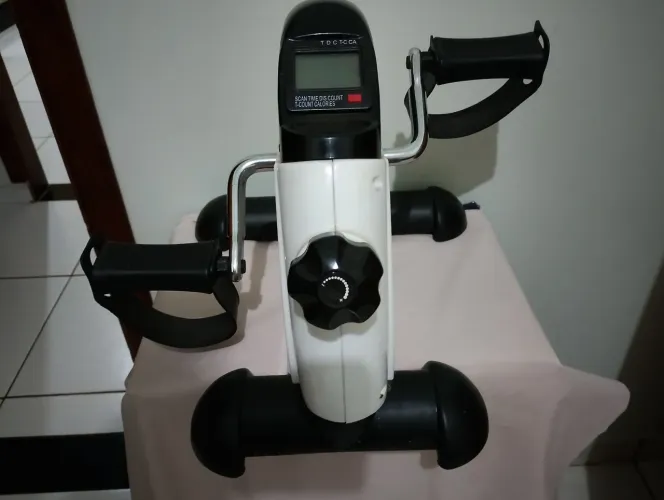 Massageador e bicicleta ergométrica