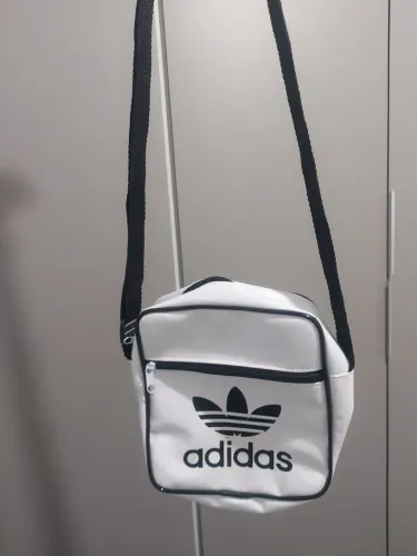 Bolsa e pochete animal print R$ 10 cada