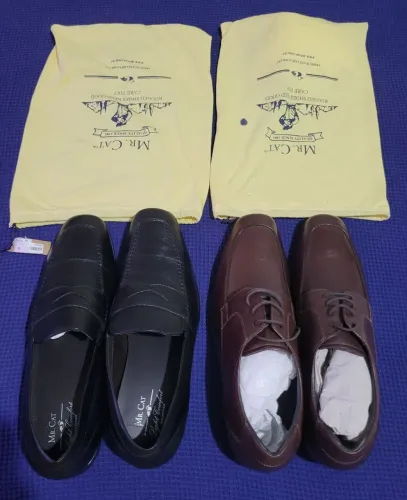 Vendo 2 pares de sapatos sociais Mr. Cat  . Numeração 42   novo na caixa nunca usados 