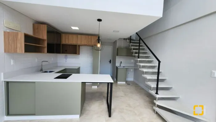 Apartamento loftem Cacupé com vista para o mar