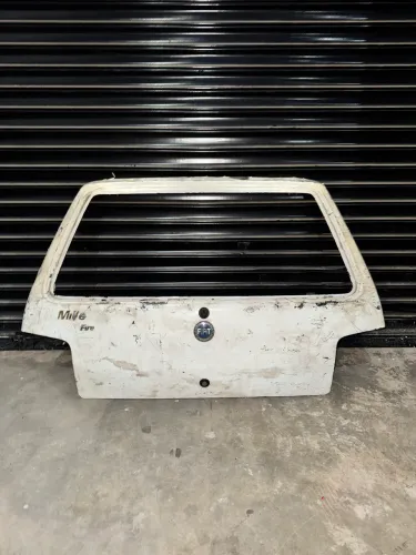 Tampa traseira Fiat Uno Mille 2003 a 2011