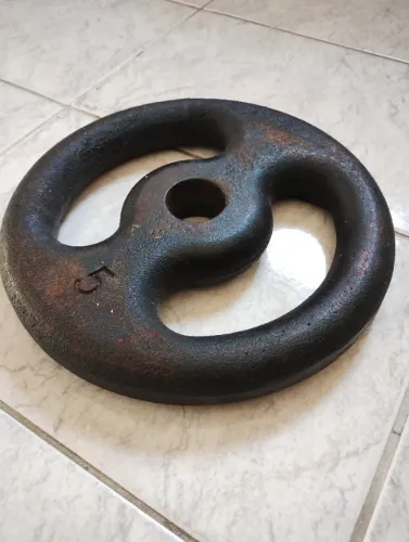 2 Anilhas 5 kg cada.