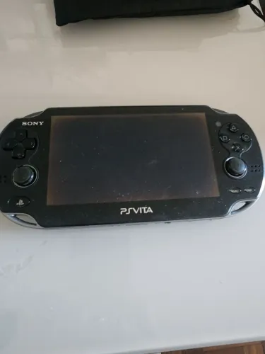 Leia o anúncio por gentileza Psvita fat 3g 11014gb com jogos Aparelho e Carregador