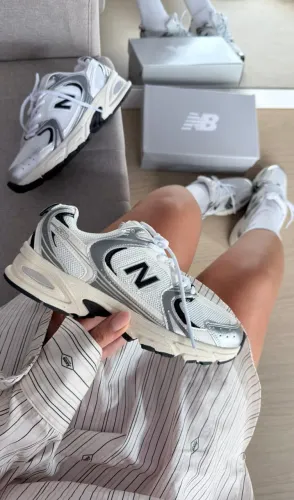 Tenis New balance 530 Linha luxo Preto Prata