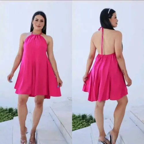 Vestido fluido aberto nas costas, possuí etiqueta, nunca usado e serve desde M até um XG