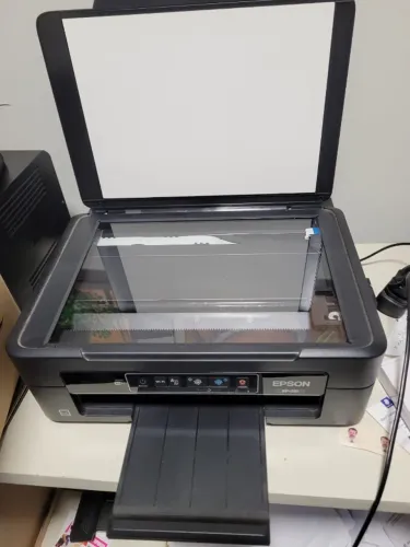 impressora Epson XP-231 com problema de impressão, mas com digitalização boa.
