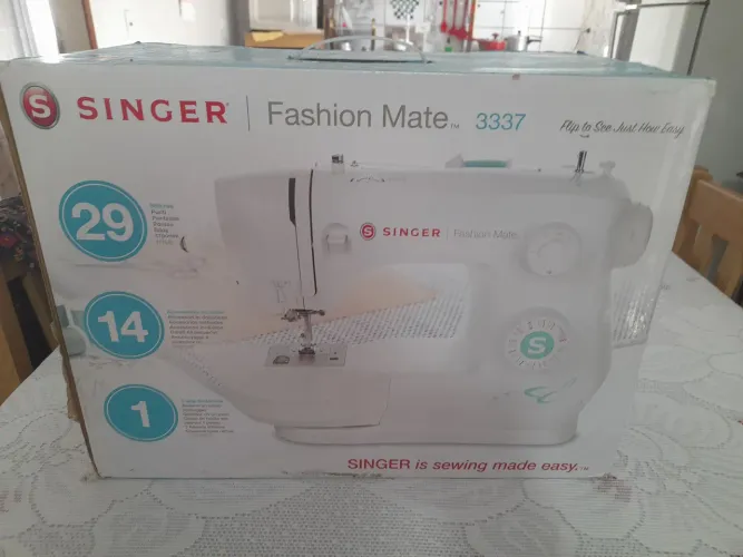 Vendo máquina de costura sinceramente nova na caixa nunca foi usada