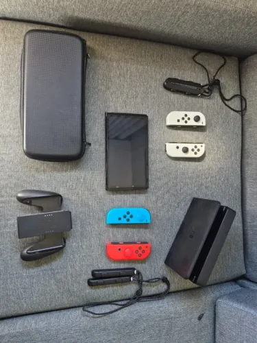 NINTENDO SWITCH OLED 64GB + SD 256GB