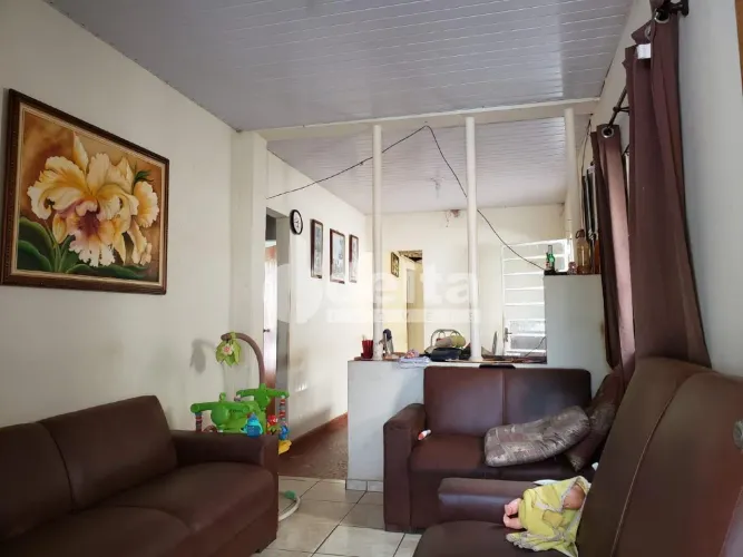 Casa residencial disponível para venda no bairro Cazeca em Uberlândia-MG