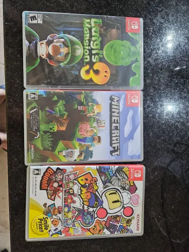 JOGOS NINTENDO SWITCH (MINECRAFT, BOMBERMAN E LUIGIS MANSION)