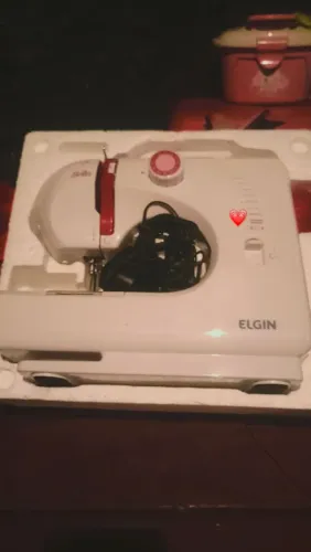 Máquina de costura elgin