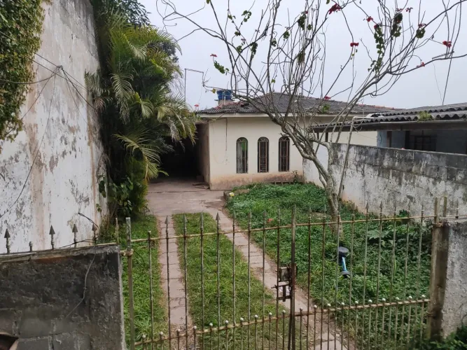 Terreno com casas escriturado à venda em Feital Mauá