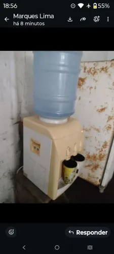 Vendo bebedouro e um microondas