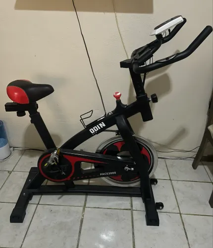 BICICLETA ERGOMÉTRICA ODIN FIT SPINNING MECANICA PACE2000 LINHA HOME 27KG