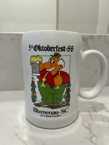 Caneco de chopp da 5ª Oktoberfest 1988 Blumenau - porcelana Schmidt