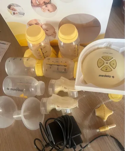 Medela Swing Maxi & Calma Bomba de Tirar Leite com 2 mamadeiras extra