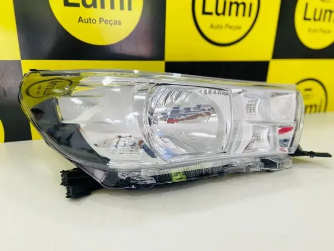 Farol Hilux 2016/... S/Led - NOVO
