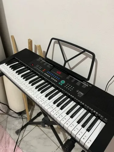 Vendo ou troco teclado spring em um violão elétrico 