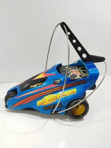 Carrinho de controle remoto tyco revolver anos 80.