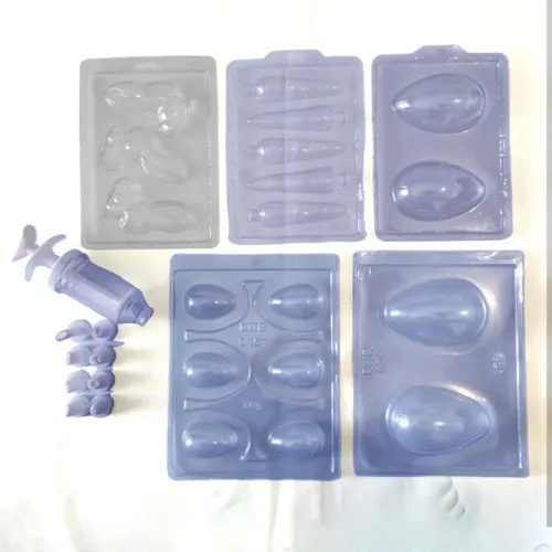 Cinco Formas de silicone para páscoa (usada uma temporada) + Decorador com 7 bicos