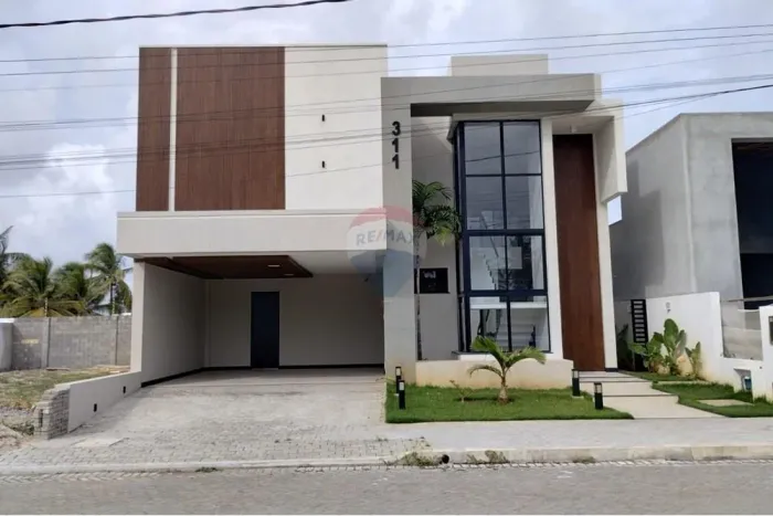 "Seu Novo Lar: Casa Luxuosa no Malui Residence na Barra dos Coqueiros