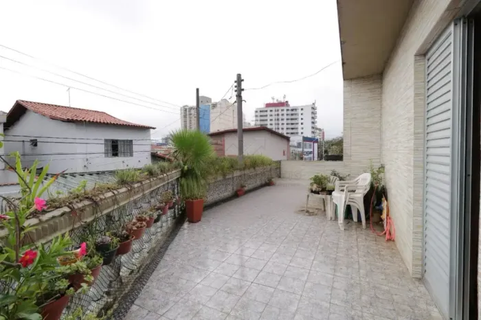 Casa com 4 dormitórios, 249 m² - venda por R$ 795.000,00 - Vila Gilda - Santo André/SP