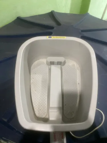 Aparelho de massagem pros pés