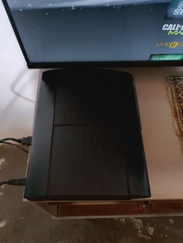 PS3 SUPER SLIM 500 GB + 10 JOGOS FÍSICOS (VALOR NEGOCIÁVEL)