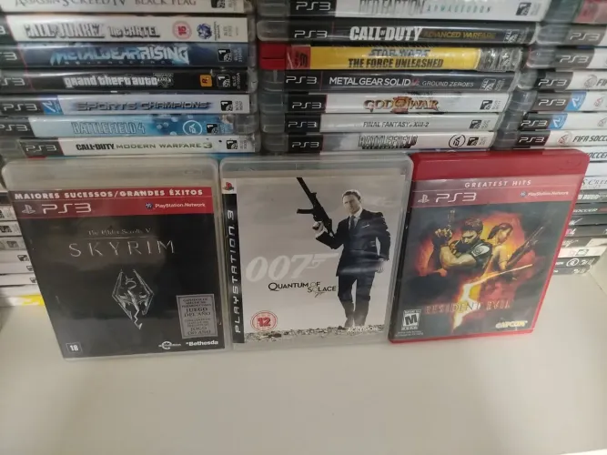 TRÊS JOGOS PARA PS3.